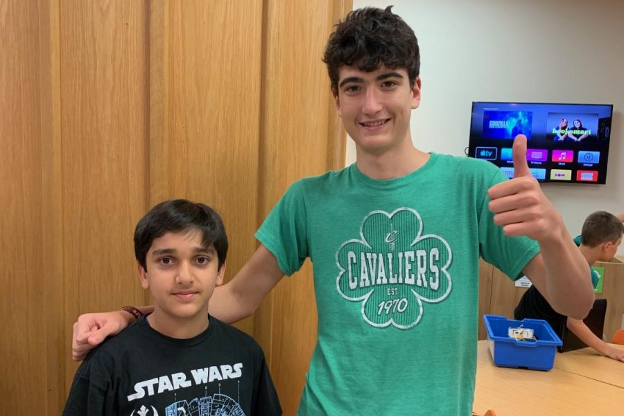Ethan+Otero+%2821%29+works+with+a+middle+school+students+during+the+lego+robotics+%28First+Lego+League%29+after+school+program.+Otero+recently+moved+back+to+ASL+after+living+in+Singapore+for+two+years.