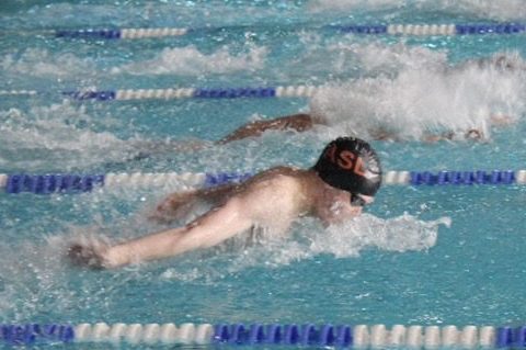 Jackson Olin ('20) performs the butterfly for ASL during a swim meet. Olin will be a part of the swim and dive team at Boston University.