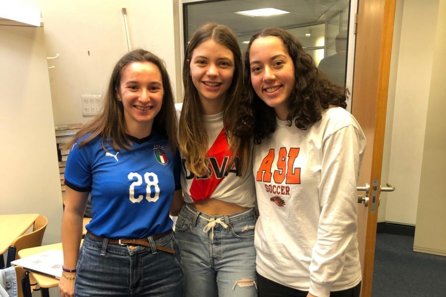 Alice Agostinelli (22), Maxime Wandsworth (22), and Rachel Brooks (22) pose in their soccer related clothing Feb. 13 for sports day. The Freshman dressed up as baseball; the juniors dressed up as basketball; and the senior wore yoga related attire.