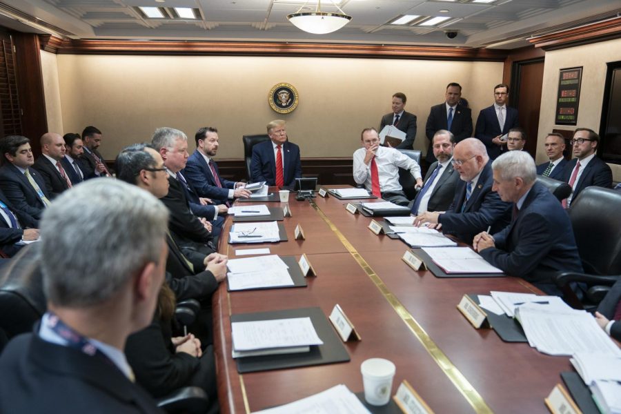 President Donald Trump attends a meeting  concerning the coronavirus outbreak. Over 10,000 Americans have been infected with the disease, prompting widespread business and school closures. As a result of the economic risk posed by these measures, the Trump administration has put forward a trillion-dollar economic stimulus package, the largest since the 2008 financial crisis.