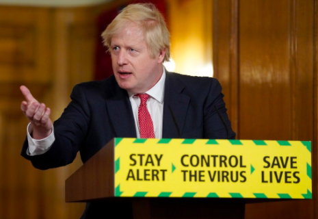 U.K. Prime Minister Boris Johnson gives a briefing on the U.K.’s COVID-19 outbreak. The government introduced a new plan to quell the spread of the virus based on local risk levels Oct. 12.