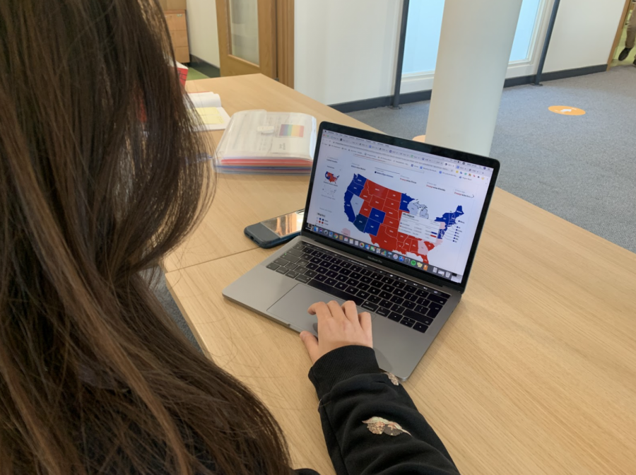 Sofia Michaelides (’22) checks the electoral map to see the state of the presidential race. The map is usually filled once students get to school, but results have been filtering in all day long and will continue into the coming days.
