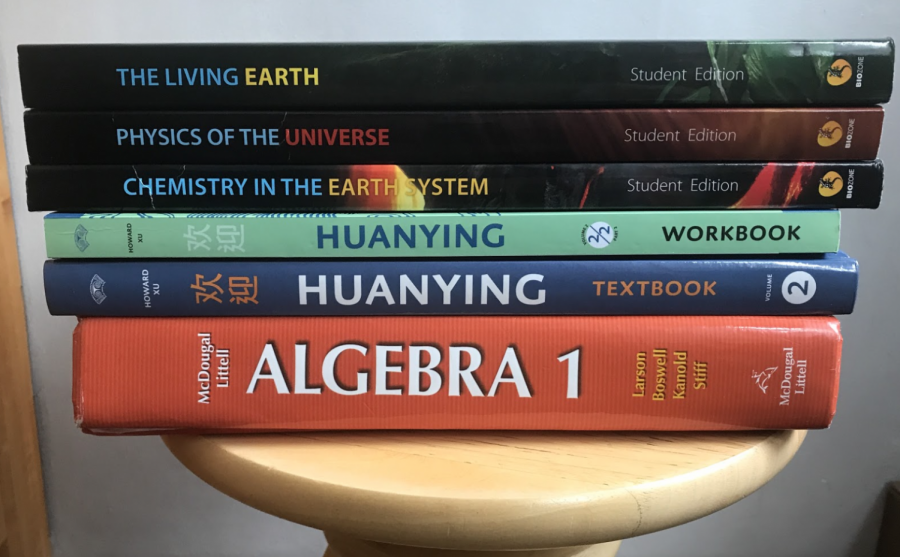Grade 9 students receive new textbooks that contribute to their high school workload. Many of these textbooks, which were scarcely used in middle school, are new additions for Grade 9 students.  