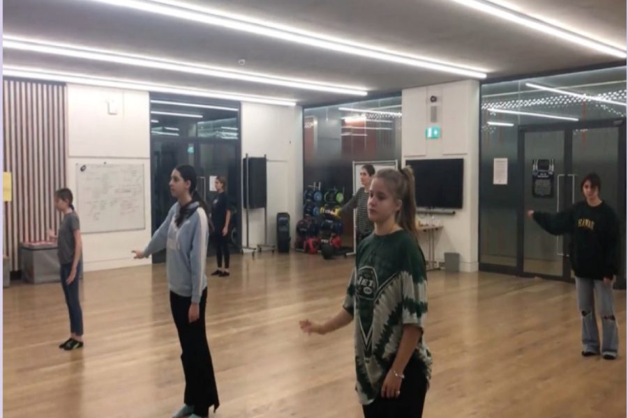 Dance students rehearse their routine in December for a pre-recorded performance video. Students in PE, dance and fitness are not required to wear masks while exercising as long as social distancing and COVID protocols are followed.