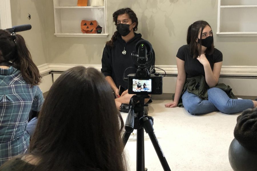 Ruby Read (’23) and Ellie Taylor (’23) act in a scene filmed at 47 Grove End Road May 8. Read and Taylor are both enrolled in the Advanced Acting: TV and Film class and collaborated with two other film classes to produce three-minute films for the annual High School Film Festival.