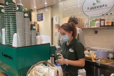 Sophie Galuga (’23) prepares a coffee order at Laurents on St John’s Wood High Street. She has worked part-time as a barista and sales assistant at the deli since Aug. 12.