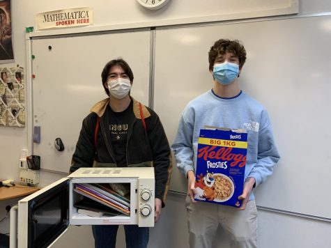 Seth Friend (’22) and Baxter John (’22) bring in alternative methods of carrying school supplies on Anything But a Backpack Day Feb. 17. Students had the opportunity to dress up and win spirit points for their grade. To encourage participation, Cameo videos of public figures were posted on the StuCo instagram page.