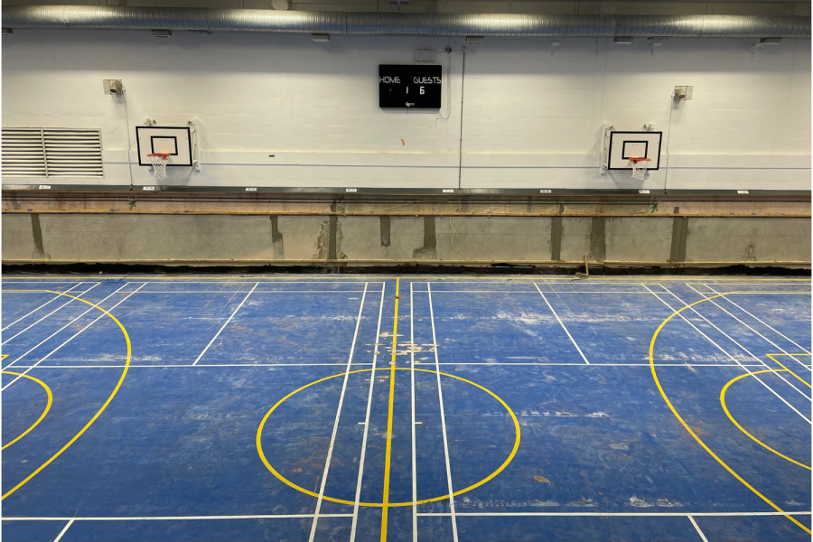 The Blue Gym floor will undergo renovation over the summer. Water seeped into the wood slats underneath the floor due to a leak, which caused damage and subsequently posed risks to students.