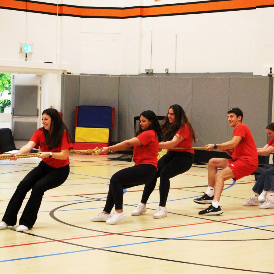 Grade 12 students engage in a tug of war competition May 31. Finalists in the tug of war competition – Grades 11 and 12 – will face off to determine the winner June 10 at the Bangers and Bash event. 