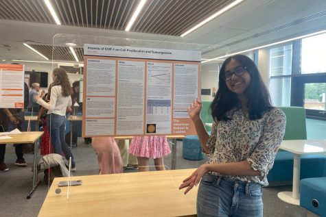 Priya Shah (’22) presents her Advanced Independent Research Colloquium poster at the Research Symposium June 7. Throughout the research process, she overcame challenges and experienced highlights before presenting the cancer research project she conducted to students and faculty.
