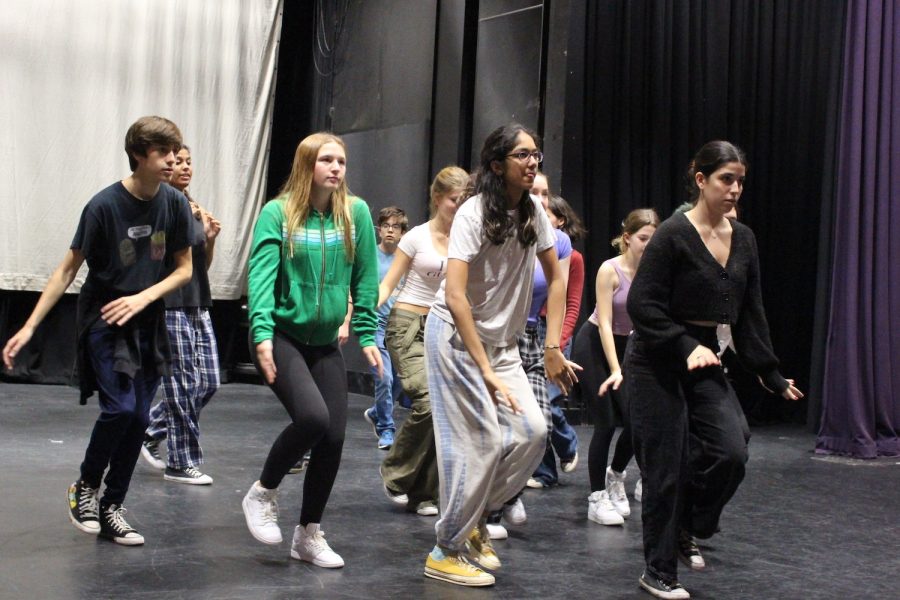 Lou Michelson (’24), pictured on the far right, dances in the musical number “What You Want” during a rehearsal Sept. 23 for the High School fall production of “Legally Blonde.” As a new student from California, Michelson received the news she was cast as the lead character, Elle Woods, shortly after the new school year began.