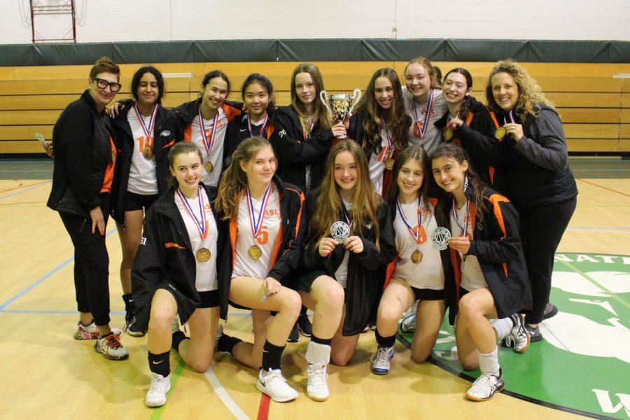 The varsity girls volleyball team poses after winning the ISST competition Nov. 12. The teams victory at the competition was the first since 2015. 