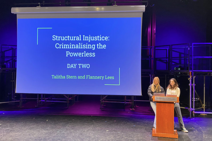During day two of their workshop “Structural Injustices: Criminalising the Powerless,” workshop leaders Talitha Stern (’24) and Flannery Lees (’24) begin their presentation March 3 on the wrongful conviction of Michael Morton, a victim of the criminal justice system. The previous day’s discussion delved into the inequalities in the U.S. penal system and its biases against marginalized communities. 