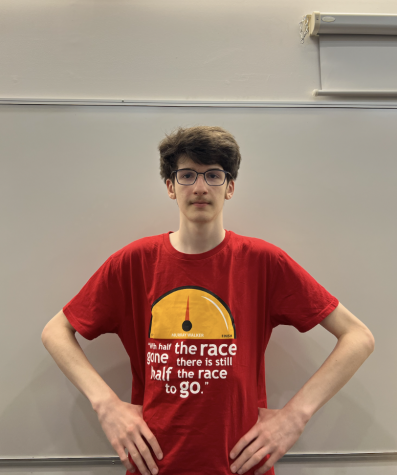 Danny Joseph (‘26) poses in one of his favorite inspirational shirts. Joseph dives into his passion for space and Formula One.