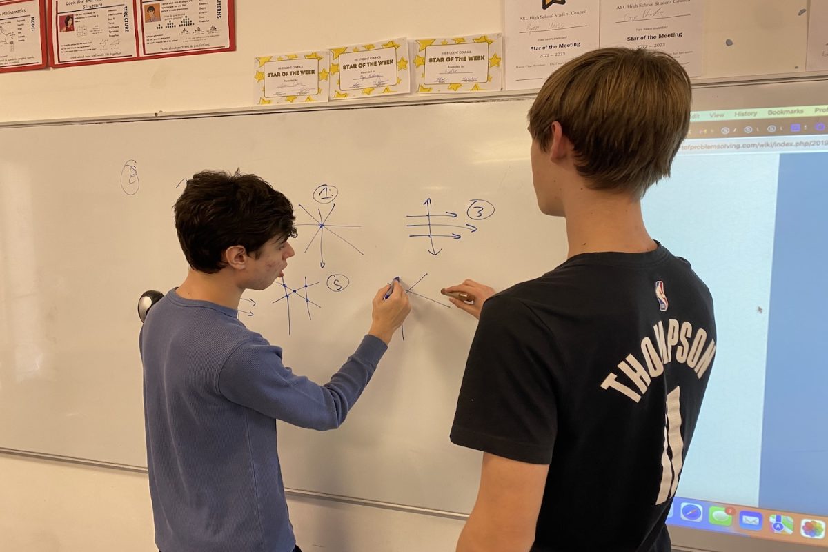 Math team members Matteo Salloum (’24) and Shelbe Yousey (’25) work on a practice problem. The team has been meeting every Tuesday to prepare for the upcoming competition.