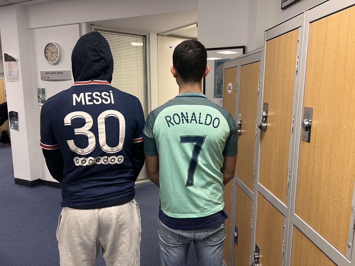Adam Sawan (’24) and Neel Roy (’25) wear shirts representing soccer players Lionel Messi and Cristiano Ronaldo. These two players have gone head to head for the last 15 years, causing debate regarding which one was is better.