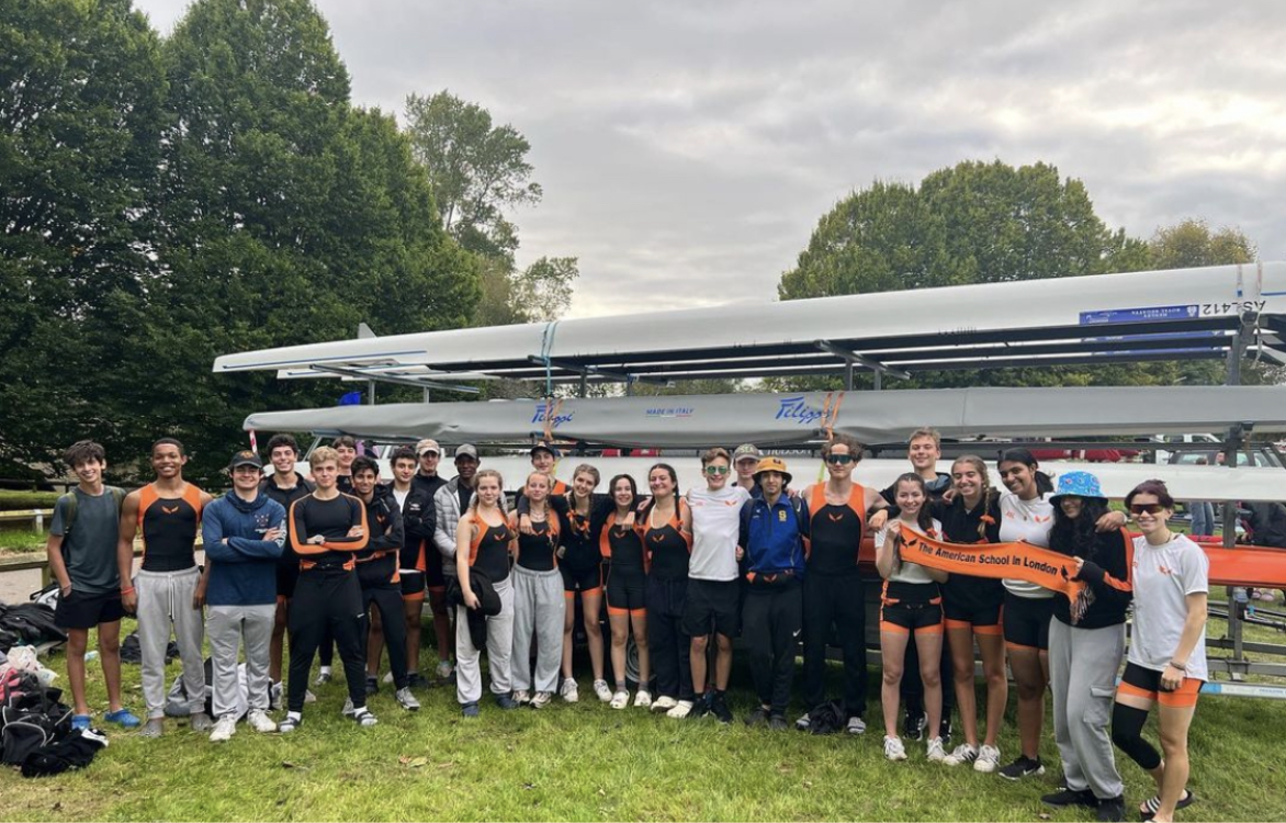 The+crew+team+celebrates+together+after+the+majority+of+the+team%E2%80%99s+first+race+of+the+season+at+the+Wallingford+Long+Distance+Sculls+Sept.+30.+The+team+competed+in+the+race+after+training+throughout+the+fall+in+preparation+for+their+upcoming+races.+