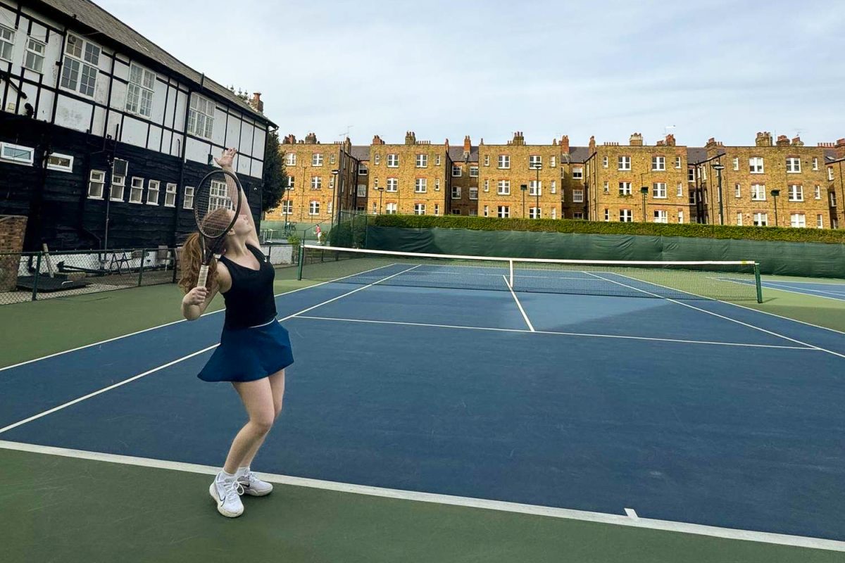 Ela Gülener (’24) practices serving at practice April 12. Tennis tryouts took place over three days in four locations for boys and girls including Paddington Sports Club, Finchley Manor, Canons Park and Gladstone Park.