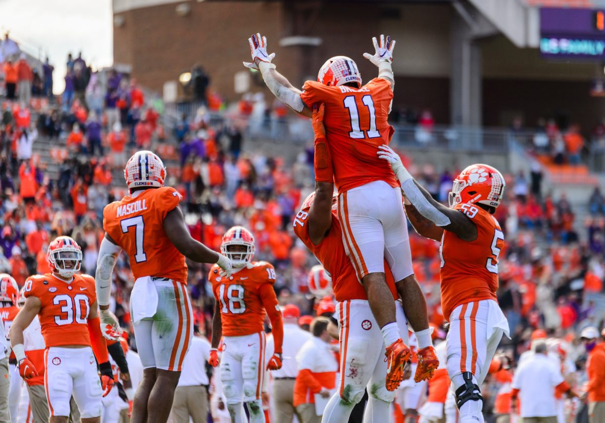 Bryan+Bresee+of+Clemson+University+is+hoisted+into+the+air+by+his+teammates+after+a+successful+safety.+Clemson+beat+Boston+College+34-28+on+their+home+soil+of+Memorial+Stadium+Oct.+31%2C+2020.
